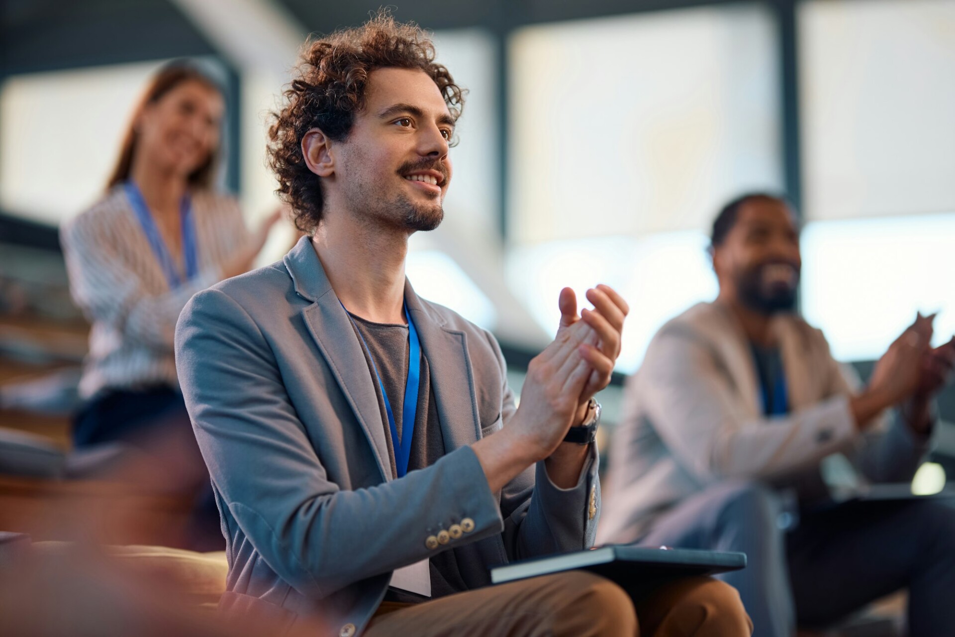 Conference room with person applauding